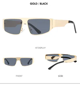 Detail view of futuristic gold metal frame sunglasses with black temples and grey lenses
