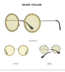 Runde randlose Sonnenbrille mit silbernem Rahmen und gelben Gläsern in der Ansicht
