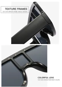 Detail shot of black oversized sunglasses frame with silver metal rivets and wide temples