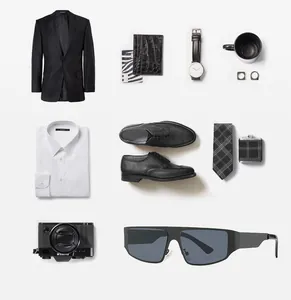 Flat lay of men's business fashion set with black sunglasses and leather accessories