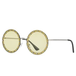 Retro runde randlose Damen Sonnenbrille mit Strassbesatz und hellgelben Gläsern