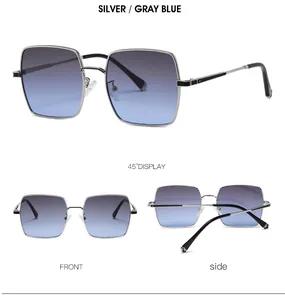 Vue détaillée de lunettes de soleil carrées argentées avec verres dégradés bleu-gris