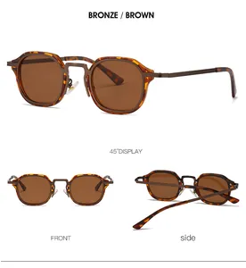 Détail de la monture en écaille et des branches en métal bronze des lunettes de soleil