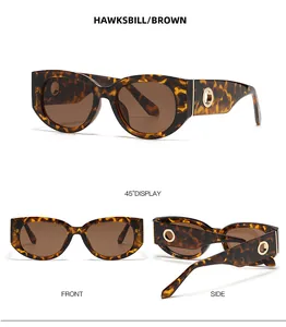 Fashionable hawksbill oval sunglasses with brown lenses and gold metal temple detail