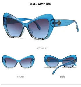 Vistas detalladas de gafas de sol cat-eye azules con patrón de mármol y logo dorado