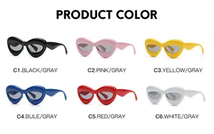 Griglia di occhiali da sole cat-eye oversize in nero, rosa, giallo, blu, rosso e bianco