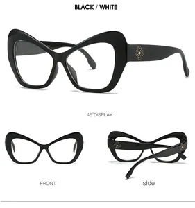 Vistas multiangulares de gafas de sol cat-eye negras con detalles florales dorados