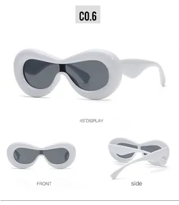 Three-view display of white oversized Y2K sunglasses with wavy frames and dark lenses