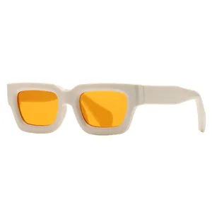 Vintage square sunglasses with creamy white frame and orange lenses in 45-degree view
