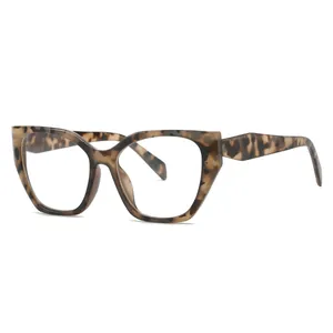 Lunettes œil-de-chat tendance avec monture polygonale irrégulière et motif écaille de tortue