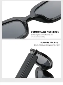 Detail view of comfortable nose pads and wide temples on black polygonal sunglasses