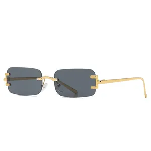 Vintage rimless rectangle sunglasses with gold metal frame and dark grey lenses