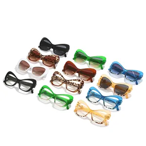 Gafas de sol de mariposa de moda para mujer en varios colores con acabado brillante