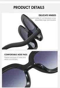 Detail of durable metal hinges and comfortable nose pads on black oversized sunglasses