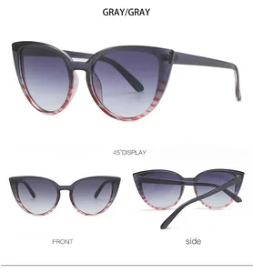 Cat eye sunglasses detail in gray with unique red and white striped frame decoration