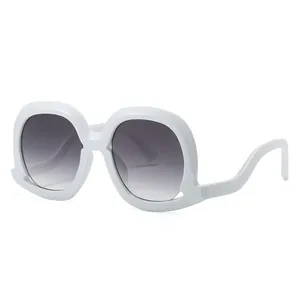 Stylish white oversized sunglasses with wavy temples and gradient lenses on white background