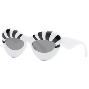 Fashion cat-eye sunglasses with white frame and black stripe patterns for a trendy look