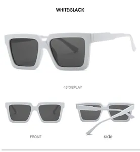 Macro detail of white square frame sunglasses with black lenses and thick retro temples