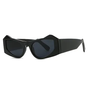 Fashion cat-eye sunglasses in black acetate with geometric frames and gray lenses