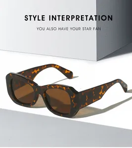 Detail einer Vintage-Sonnenbrille mit dicken Tortoise-Rahmen und braunen Gläsern für Damen