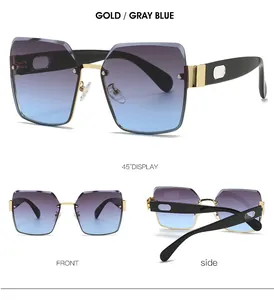Drei Ansichten einer Vintage-Oversize-Randlossonnenbrille mit blauem Farbverlauf