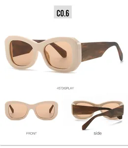 Detailansichten der übergroßen cremefarbenen Sonnenbrille mit Schildpattbügeln und Gläsern