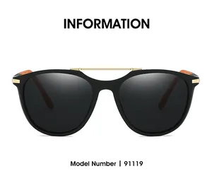 Frontansicht der ovalen polarisierten Sonnenbrille 91119 mit Goldbrücke und schwarzem Rahmen
