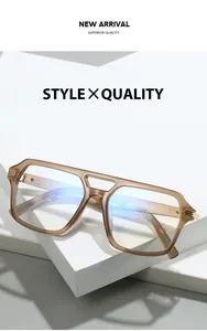 Detail view of transparent amber square frame glasses with anti-blue light coating