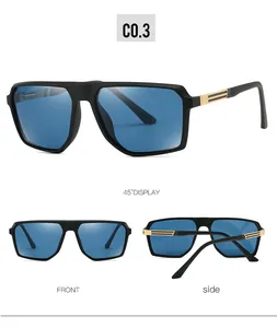 Detail view of square black matte sunglasses featuring classic red and green temple accents