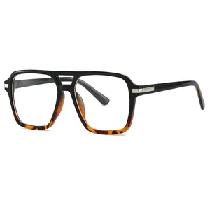 Modern retro oversized square eyeglasses with black and tortoiseshell color blocking frame