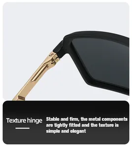 Detailed macro view of the durable gold metal hinge and matte black sunglasses frame