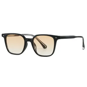 Fashionable TR90 sunglasses with black frame, orange gradient lenses, and silver rivets