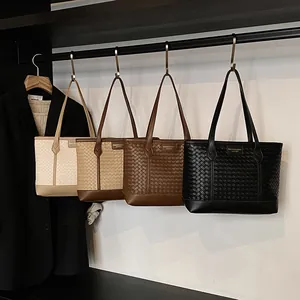 Large woven tote bags displayed in four colors for women's stylish daily commuting