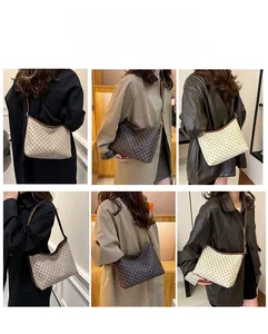 Detail shots of vintage monogram tote bags in brown and cream with adjustable straps