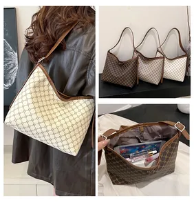 Detail view of large retro tote bag interior showing spacious capacity for daily essentials