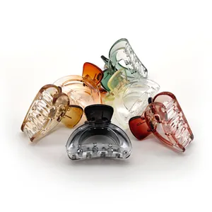 Colorful acrylic shark hair claws in assorted gradient colors on white background