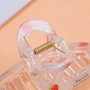 Transparent acrylic strawberry claw clip with gold spring and French slogan print
