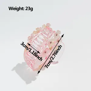 Pink floral hair claw clip with rhinestones and 7cm dimension measurement guide