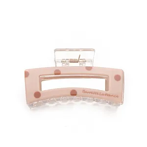 Polka dot acrylic rectangular claw clip in dusty pink with Barrette La France text