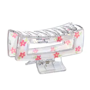 Floral rectangle hair claw clip with pink flower print on clear acrylic base