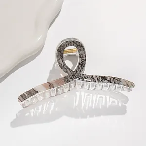 Elegante pinza per capelli da 13cm effetto marmo con molla dorata e design sobrio
