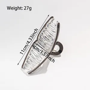 Polka dot acrylic hair claw clip with measurements 11cm length and 27g weight