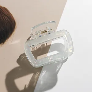 Iridescent square hair claw clip with pearlescent finish and gold metal spring