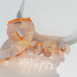Floral clover acrylic hair claw clip with pearlescent mermaid finish and rhinestones