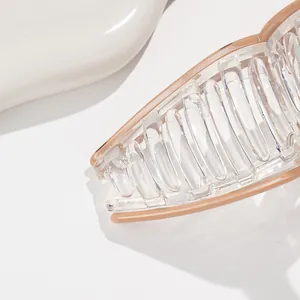Polka dot acrylic large shark hair claw clip for women in beige and transparent finish