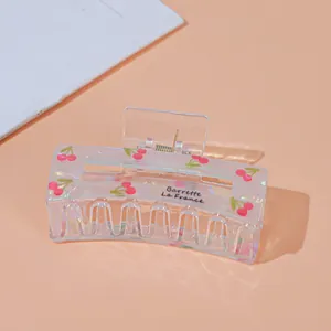 Pinza para el pelo de acrílico con diseño de cerezas rosas y texto Barrette La France