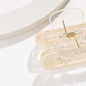 Minimalistische quadratische cremefarbene Haarklammer mit Goldfeder für Damen Styling