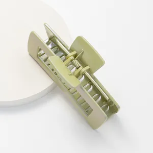 Light olive green 12cm hair claw clip with pearlescent finish and hollow rectangular design