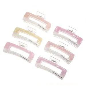 Set of six colorful large rectangle hair claws with iridescent marble acetate texture