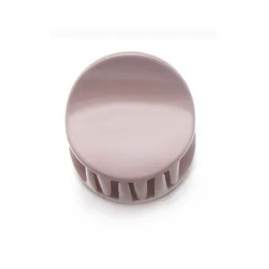 Matte mauve pink round claw clip hair accessory for children with durable grip